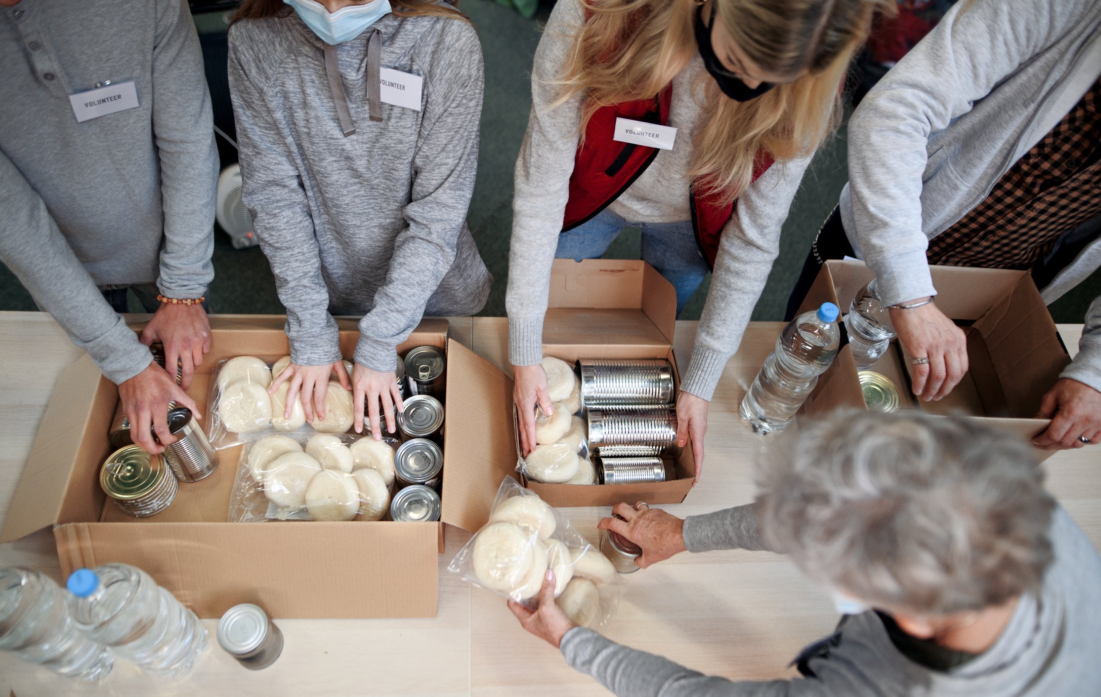 Top View of Group of Volunteers in Community Donation Center, Food Bank and Coronavirus Concept.